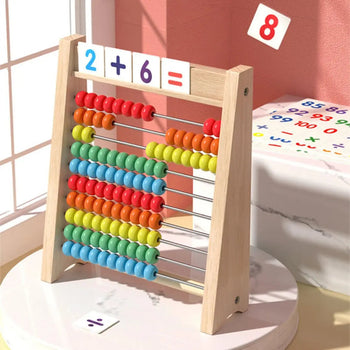 Manipulation des perles colorées du boulier MathBeads pour stimuler le calcul