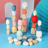 Jeu de pierres Montessori ZenStack couleurs pastel empilées sur fond design moderne