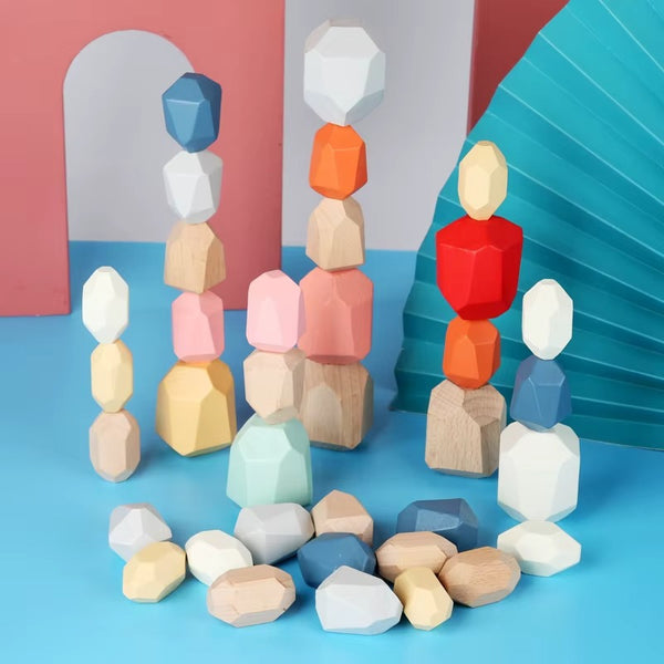 Jeu de pierres Montessori ZenStack couleurs pastel empilées sur fond design moderne