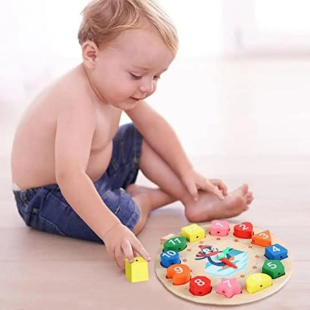 Horloge ClockPingu en bois coloré avec aiguilles manipulables Montessori