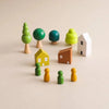 figurines arbres et maisons en bois du jeu d’équilibre Montessori HouseTilt EducaKid