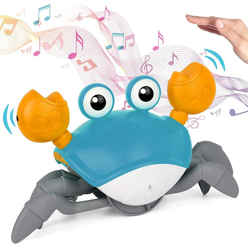 Jouet crabe interactif bleu avec musique et mouvements pour stimuler les sens du bébé