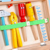 Détail des outils HandyCraft rangés dans la mallette avec élastique de maintien et finition bois