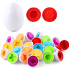 œufs Montessori ouverts avec formes de prismes colorés pour apprentissage ludique